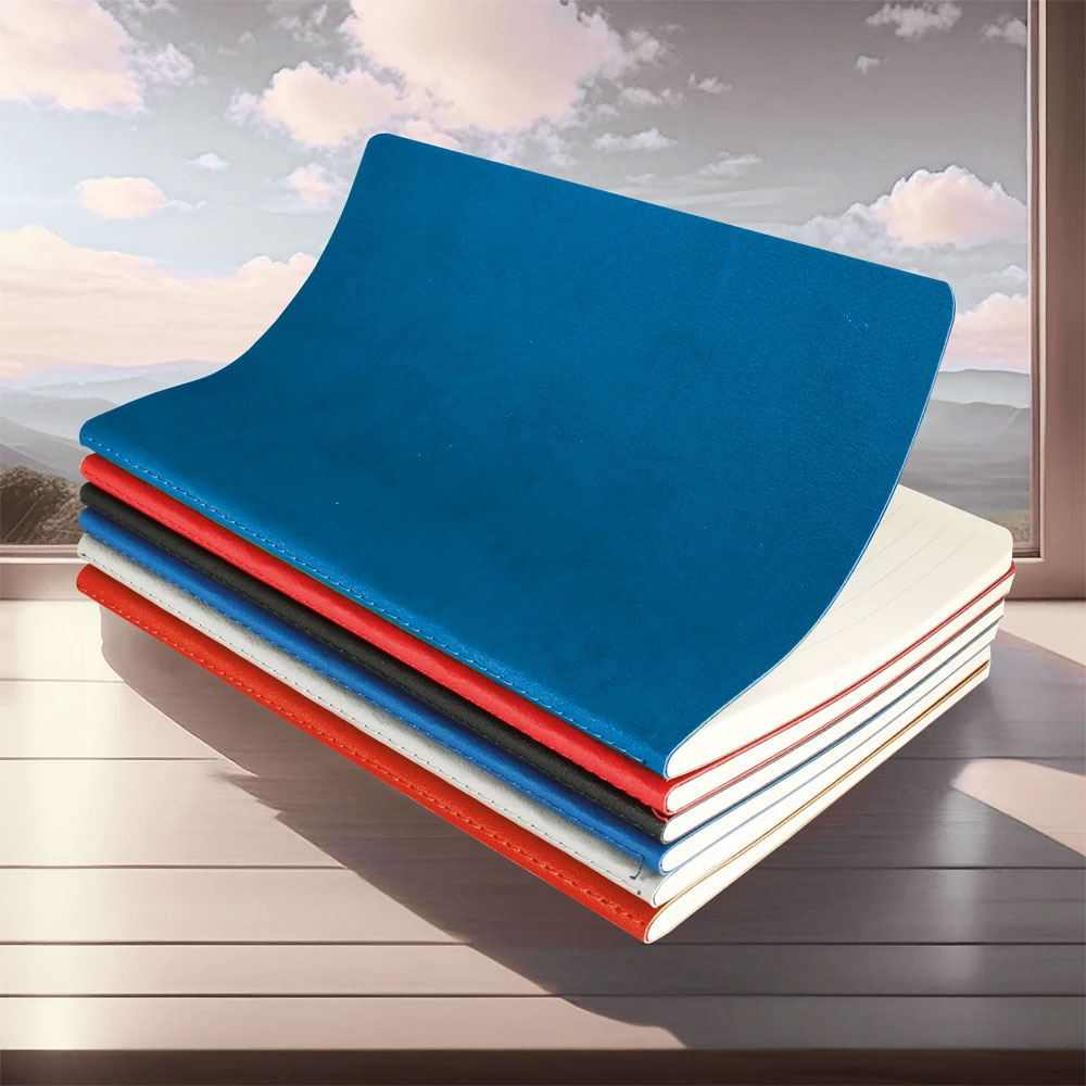 Turuncu termoderi kapaklı, terzi dikişli, baskıya uygun promosyon defter (13x21 cm)